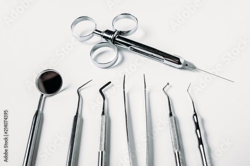 dental and endodontic restoration instruments on a white background. Top view