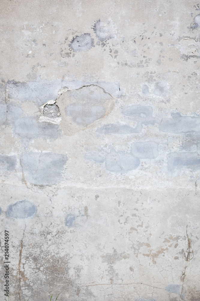 Damaged grey concrete wall exterior background texture Damaged grey concrete wall exterior background texture