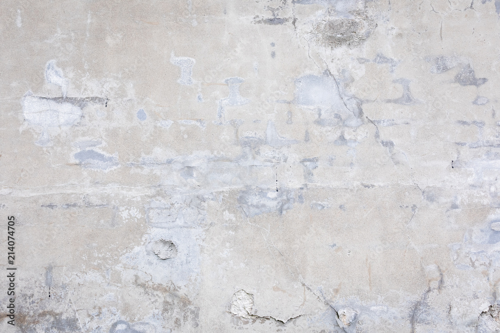 Naklejka premium Damaged grey concrete wall exterior background texture