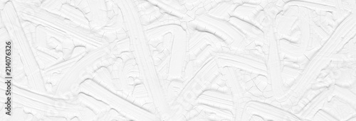 Texture of a paint of white color with patterns. Background with divorces for various purposes.