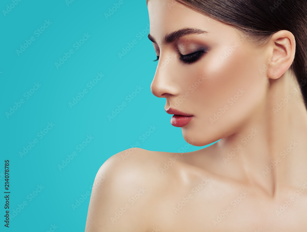 Nice Woman Face on Colorful Blue Background with Copy space for Product Placement and Advertising Marketing Concept. Beauty, Hydration, Facial treatment and Cosmetology Nice Woman Face on Colorful Blue Background with Copy space for Product Placement and Advertising Marketing Concept. Beauty, Hydration, Facial treatment and Cosmetology