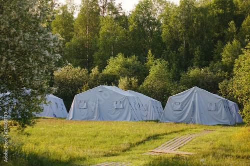 white large army tents. rescue camp. © andreysha74