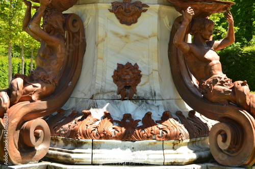 Beautiful Fountain With The Mouth Of Neptune Casting Water In The Beautiful Gardens Of The Farm. Art History Biology. June 19, 2018. La Granja Segovia Spain.