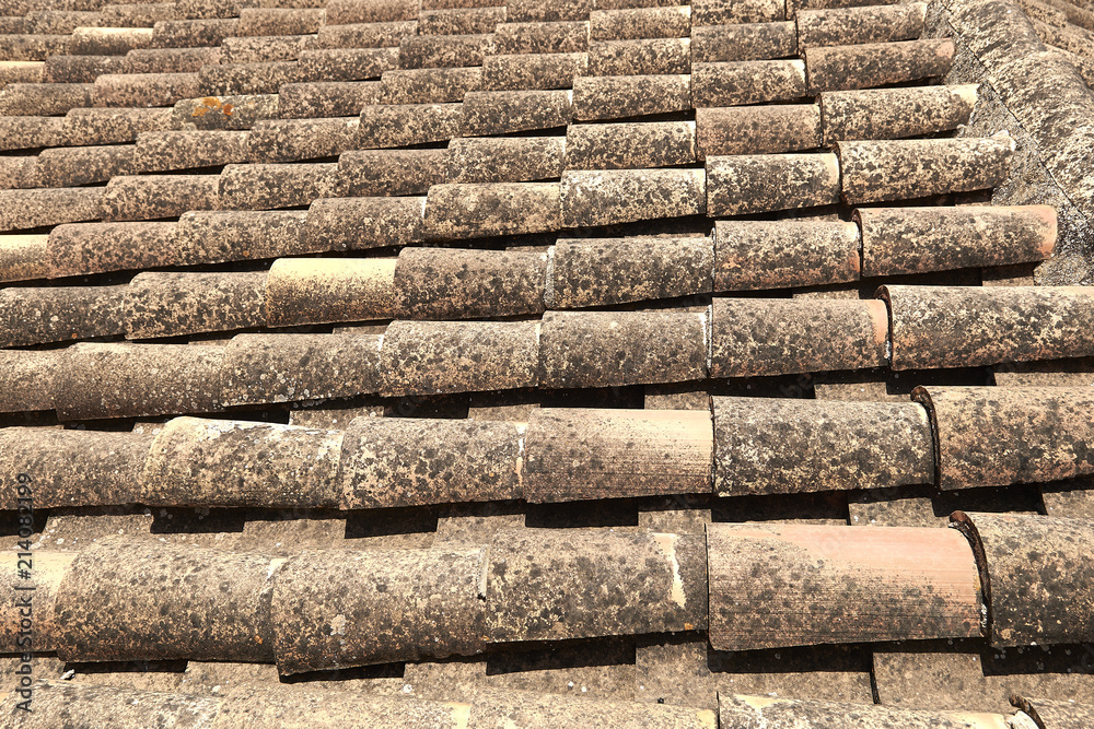 Perspective of a grungy old tiles roof in south Europe Perspective of a grungy old tiles roof in south Europe