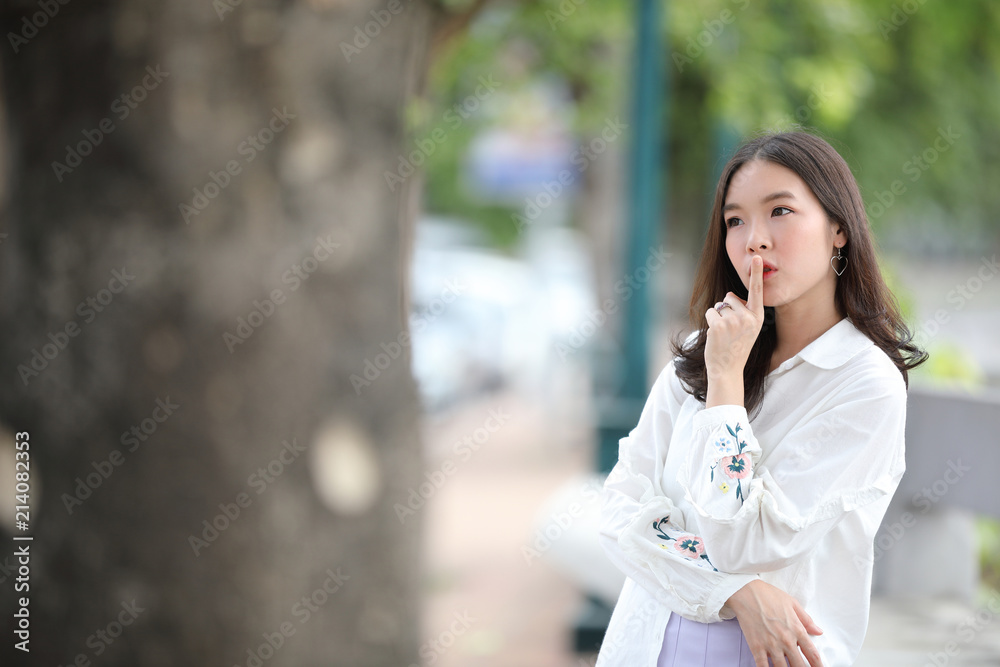 Portrait young woman thinking and looking modern style in outdoor urban background Portrait young woman thinking and looking modern style in outdoor urban background