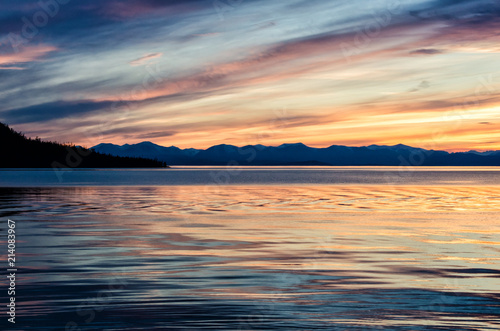 Beautiful sunset above the sea and mountain