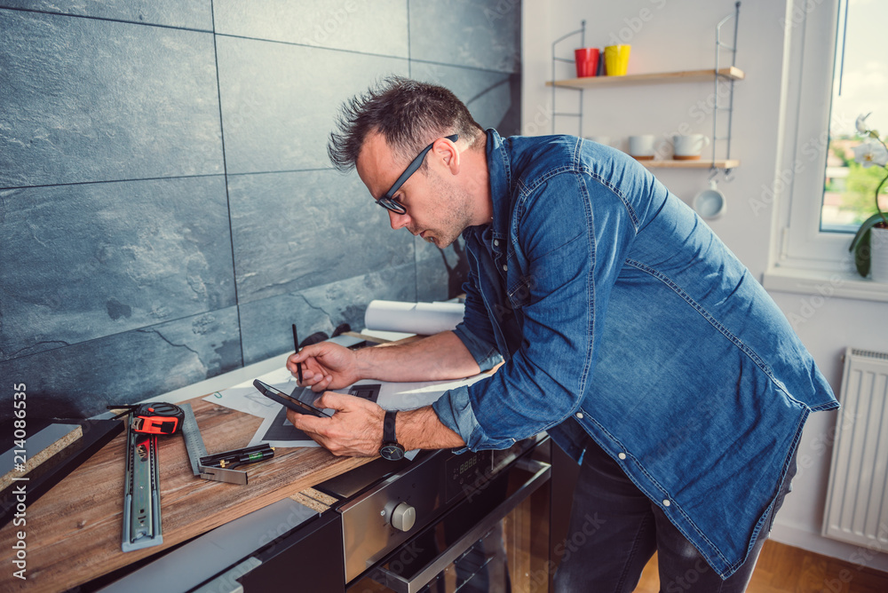Architect using smart phone Architect using smart phone