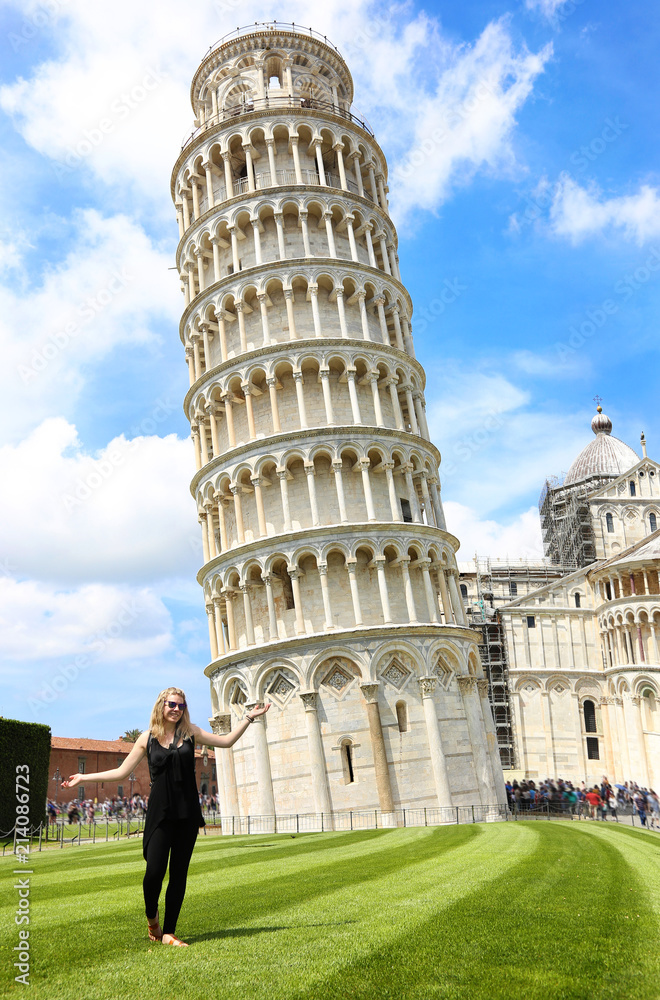 smiling girl in front of the leaning tower of Pisa Italy - famous italian landmarks