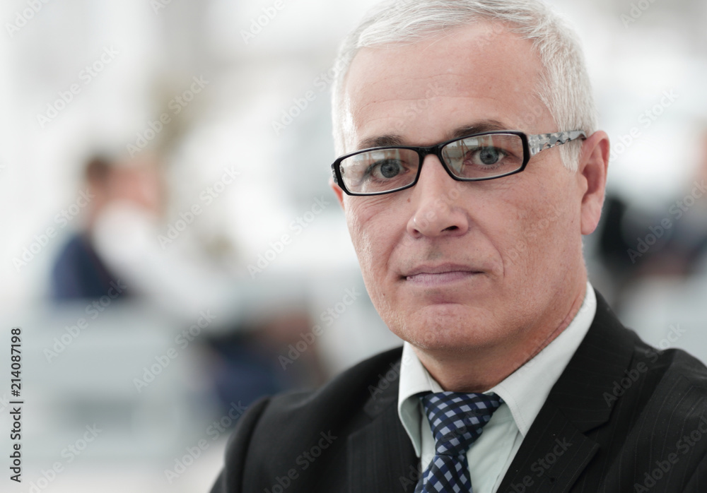 close up portrait of senior businessman in office close up portrait of senior businessman in office