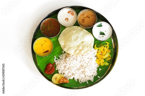 Traditional Onam Feast / South Indian  Vegetarian Thali on banana leaf photo