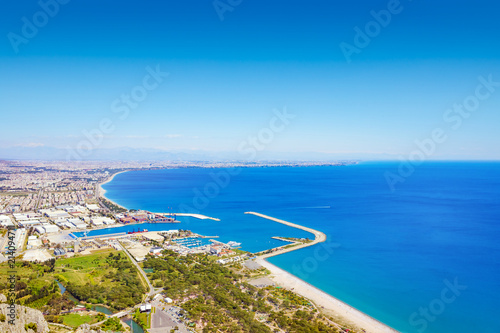 Daylight aerial view of beautiful blue sea and popular seaside resort city Antalya, Turkey.