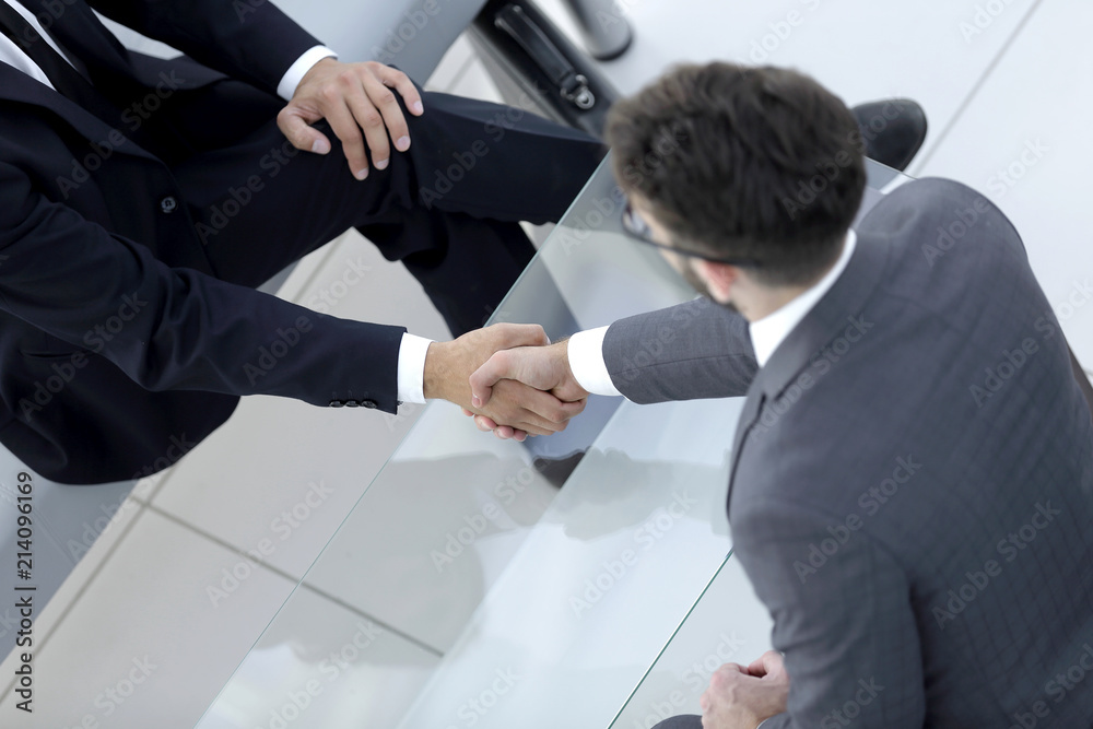 handshake Manager and the client in the office