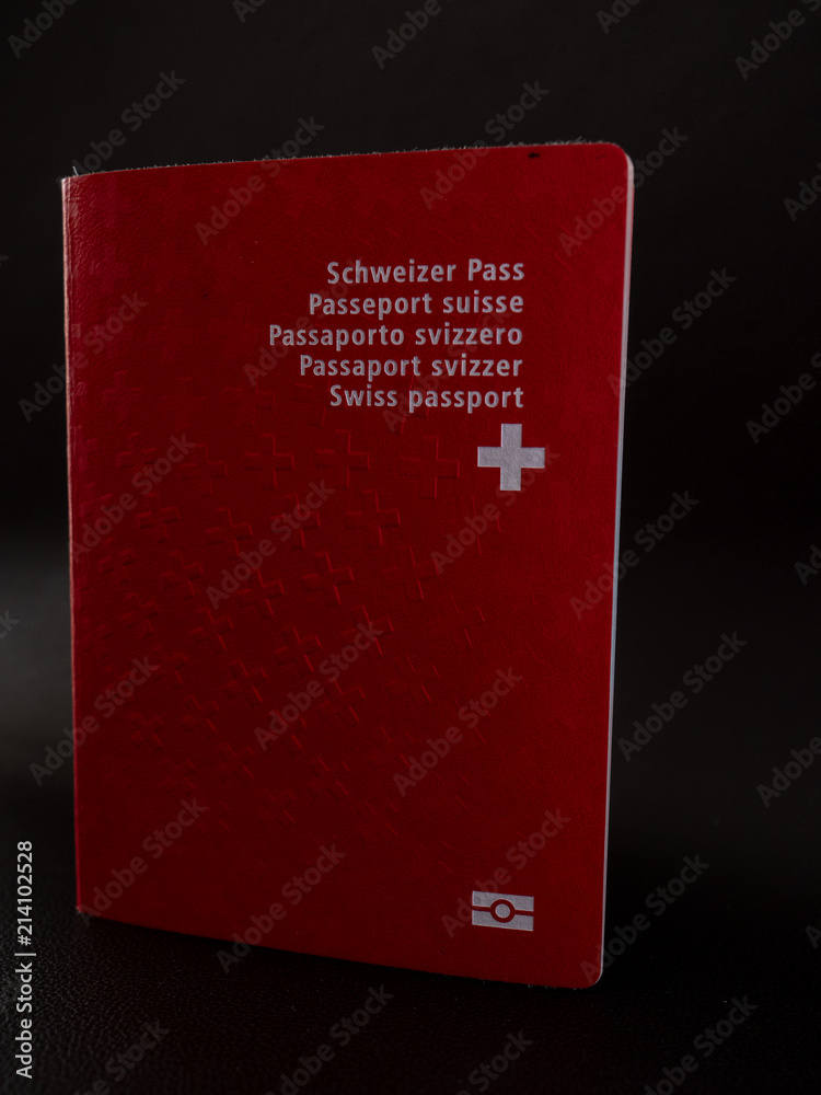 swiss passport close up on black background switzerland citizenship swiss passport close up on black background switzerland citizenship