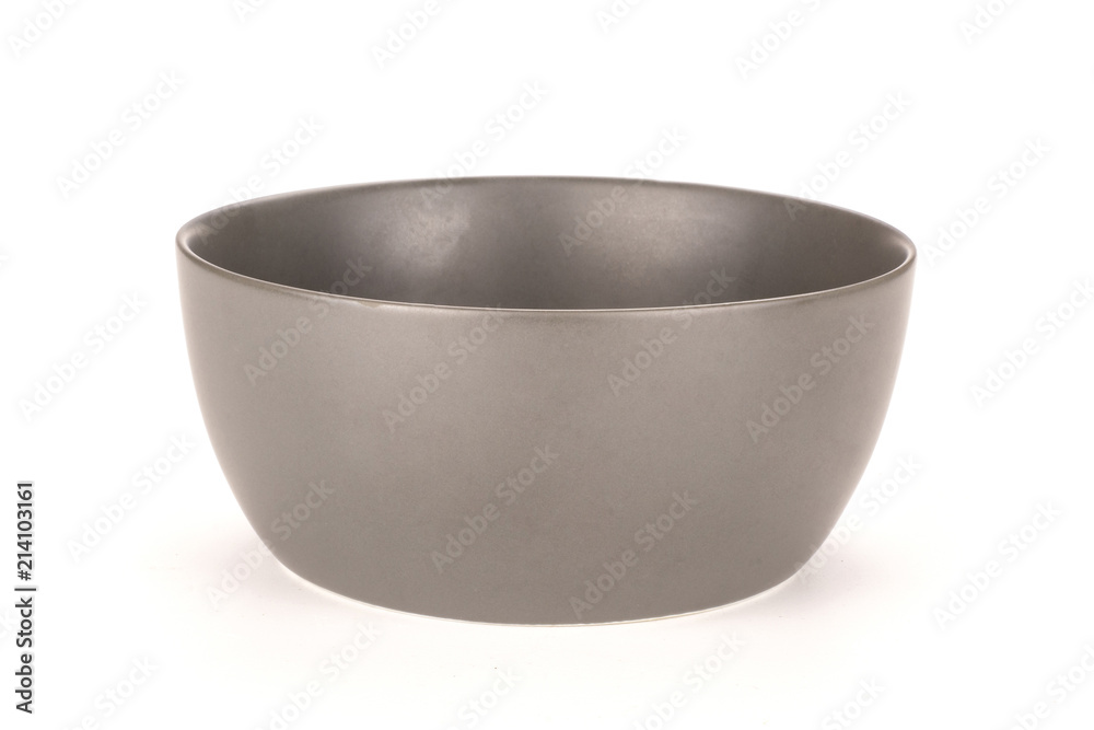 One whole kitchen tool grey ceramic bowl isolated on white One whole kitchen tool grey ceramic bowl isolated on white