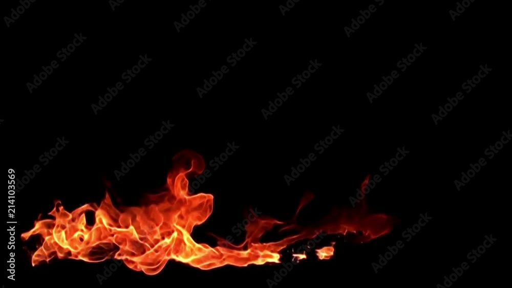 Fire flame isolated on black background. 8х slow motion / red, yellow, orange tongues of hot flame stream, twist and flash in a bewitching & hot dance on a black background Fire flame isolated on black background. 8х slow motion / red, yellow, orange tongues of hot flame stream, twist and flash in a bewitching & hot dance on a black background