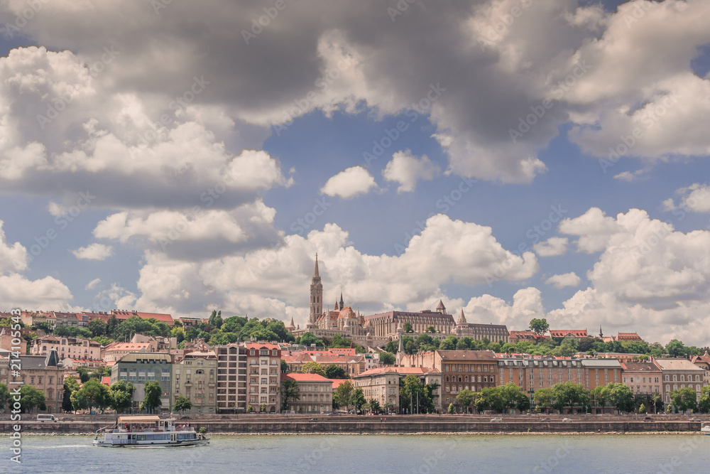 Fototapeta premium Budapest cityscape under the dramatic cloudy sky on a sunny day.