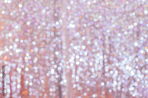 White beautiful blurred bokeh background with copy space holiday texture wall paper glitter.