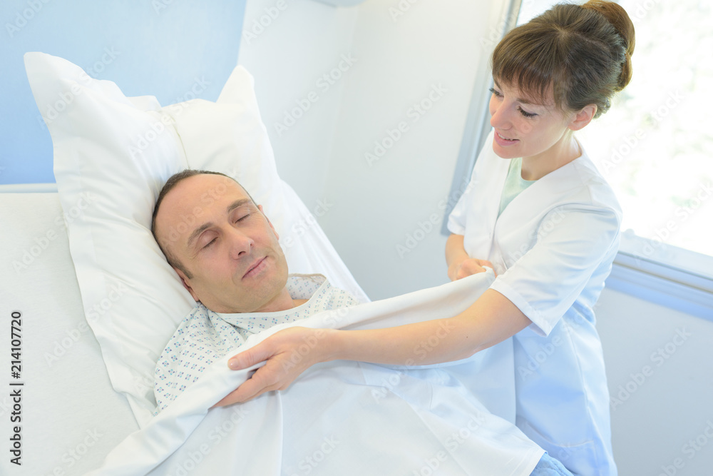 nurse talking care patient bed hospital nurse talking care patient bed hospital