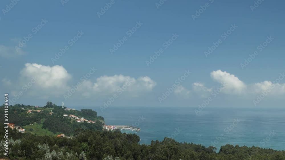 4 k Time-Laps frame posterise fasted video with view of Cnatabrian Sea from the high hill with speedy moving clouds, panoramic green hills, moving ships and boats at the summer sunny day 4 k Time-Laps frame posterise fasted video with view of Cnatabrian Sea from the high hill with speedy moving clouds, panoramic green hills, moving ships and boats at the summer sunny day