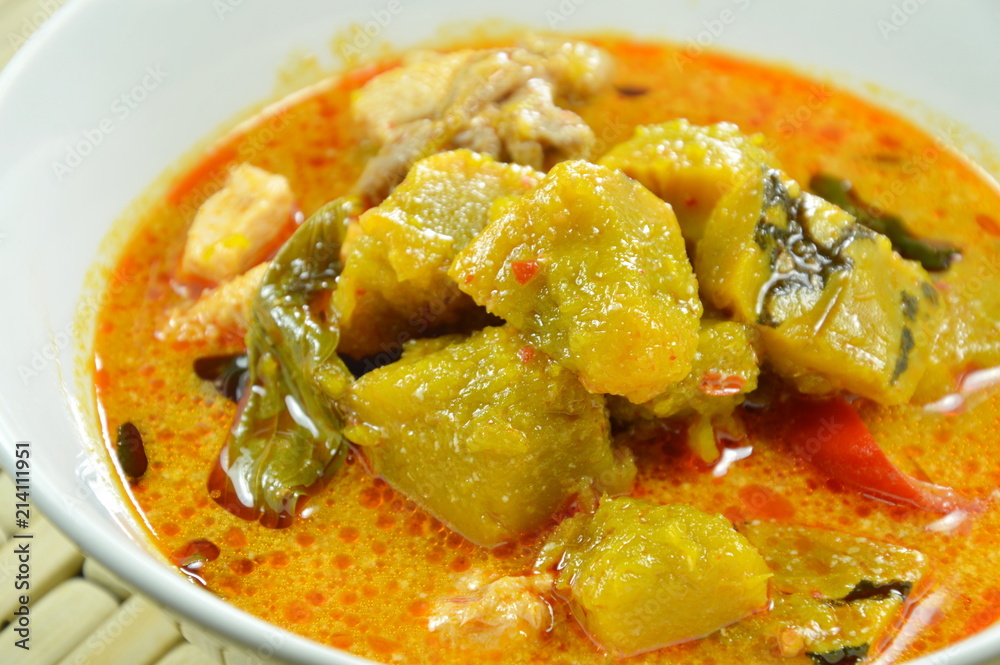 spicy boiled pumpkin with chicken in curry on bowl spicy boiled pumpkin with chicken in curry on bowl