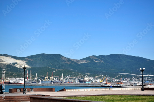 Novorossiysk, Russia - July 3, 2018: The view on the sea port and the mountains from the embankment