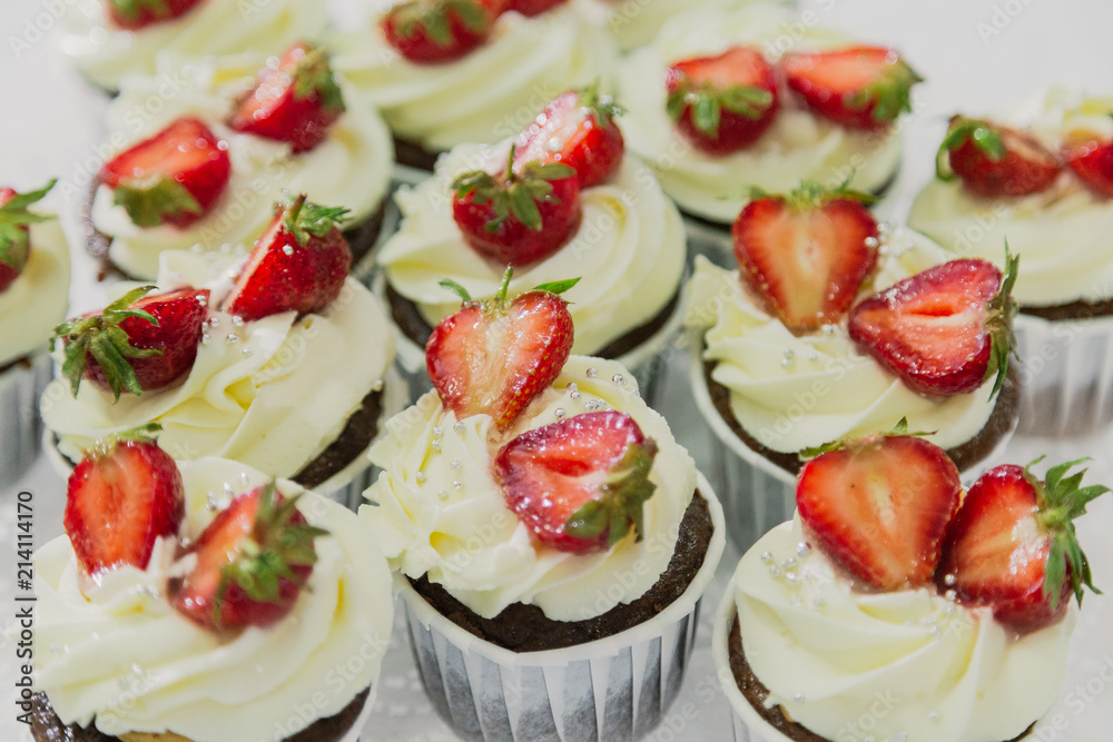 delicious dessert with strawberries and cream on a plate. delicious dessert with strawberries and cream on a plate.