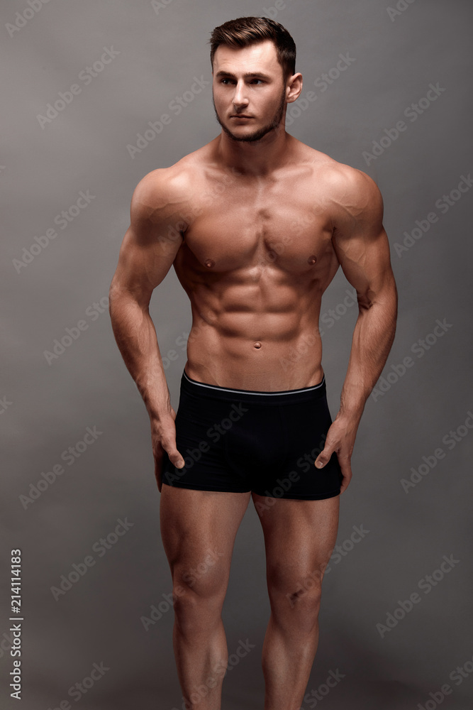 Athletic Man Fitness Model Torso showing big muscles.