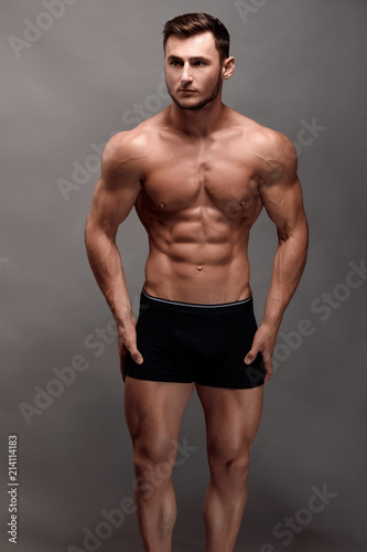 Athletic Man Fitness Model Torso showing big muscles.