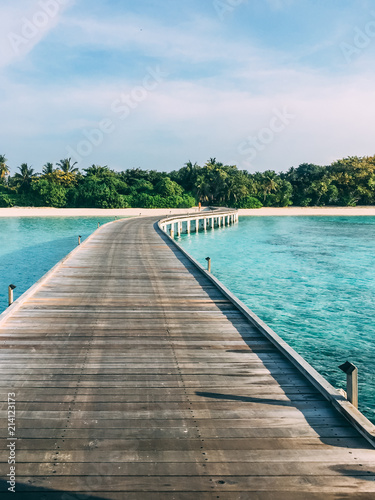 Maldives island luxury resort wooden pier