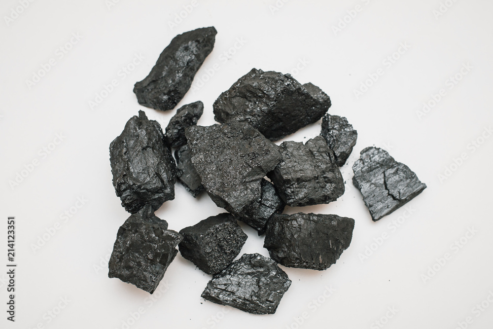 piles of charcoal isolated on white background, xylantrax, charcoal, top view. coal. brown piles of charcoal isolated on white background, xylantrax, charcoal, top view. coal. brown