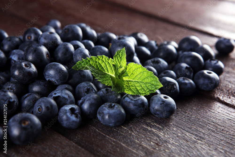 Blueberries on a rustic table, Healthy eating and nutrition concept. Blueberries on a rustic table, Healthy eating and nutrition concept.