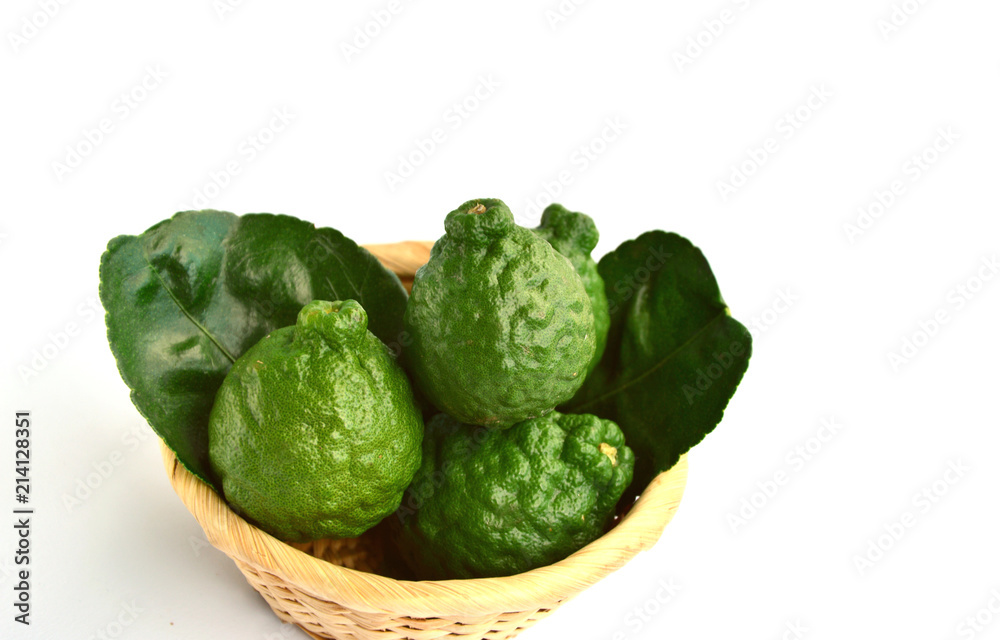 makrut lime or kaffir lime (Citrus hystrix) in basket on white background. Health Benefits of