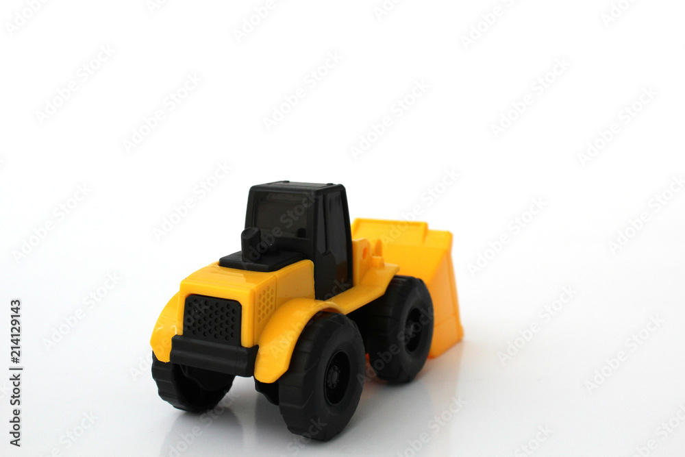 A Toy wheel loader on an isolated white background 9