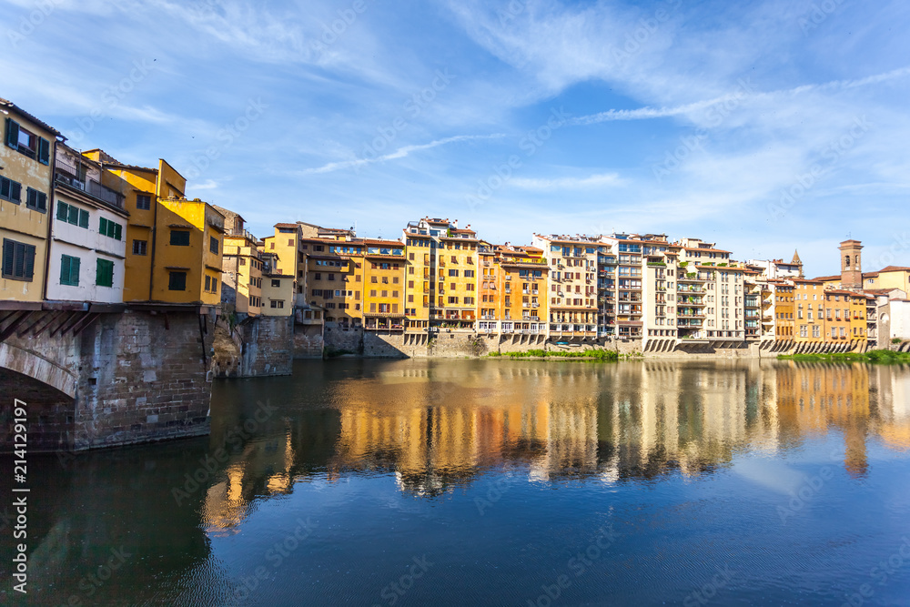 View of medieval stone bridge Ponte Vecchio and the Arno River in Florence, Tuscany, Italy