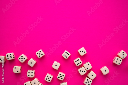 dice on a magenta background