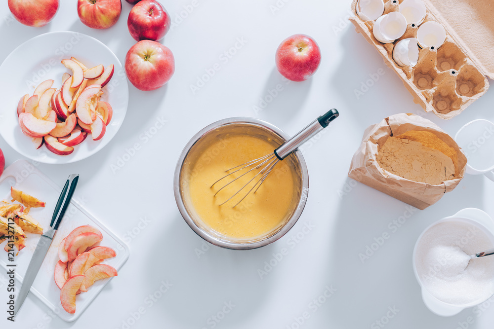Ingredients and tools for cooking apple pie