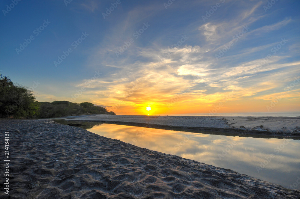 Beautiful capture of a colorful sunrise at Corona Beach in the Pacific coast of Panama