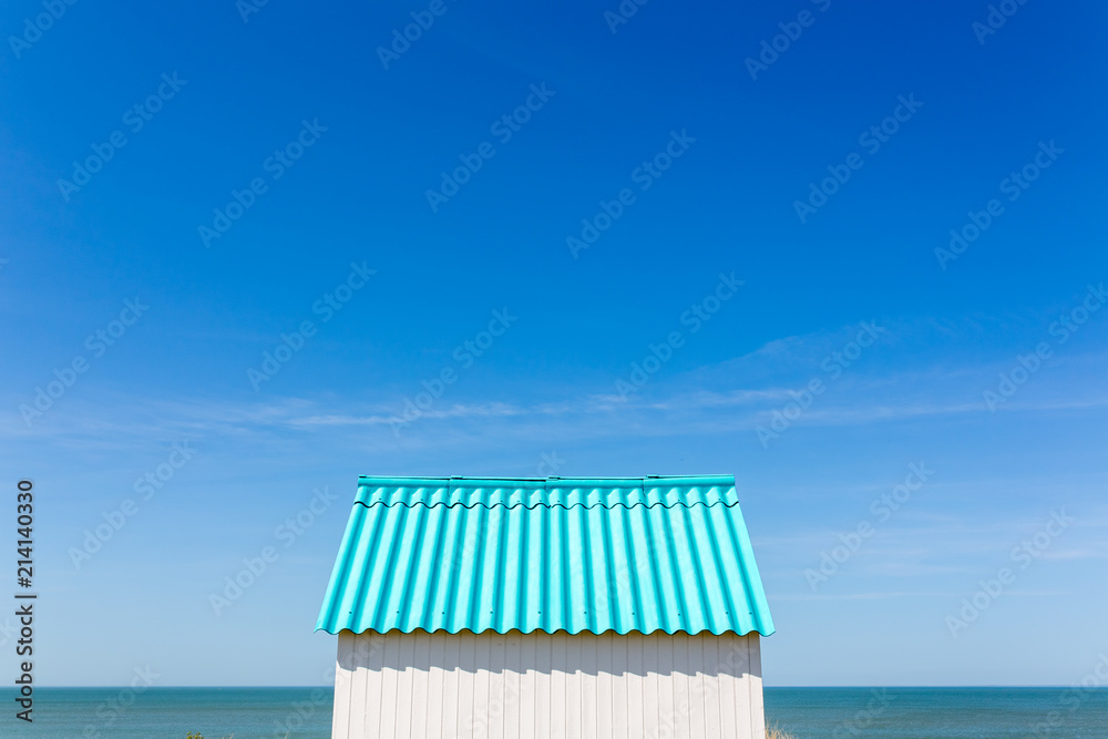 Φωτογραφία Colorful wooden beach cabins in the dunes, Gouville-sur-Mer, Normandy, France