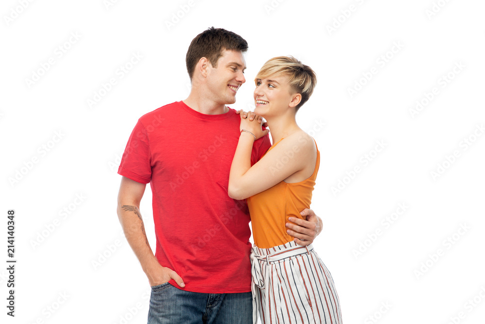 fashion, style and people concept - happy smiling couple hugging over white background fashion, style and people concept - happy smiling couple hugging over white background