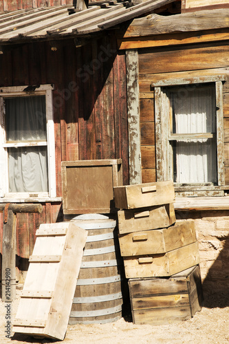 Old Wooden Crates by an Old Weathered Building