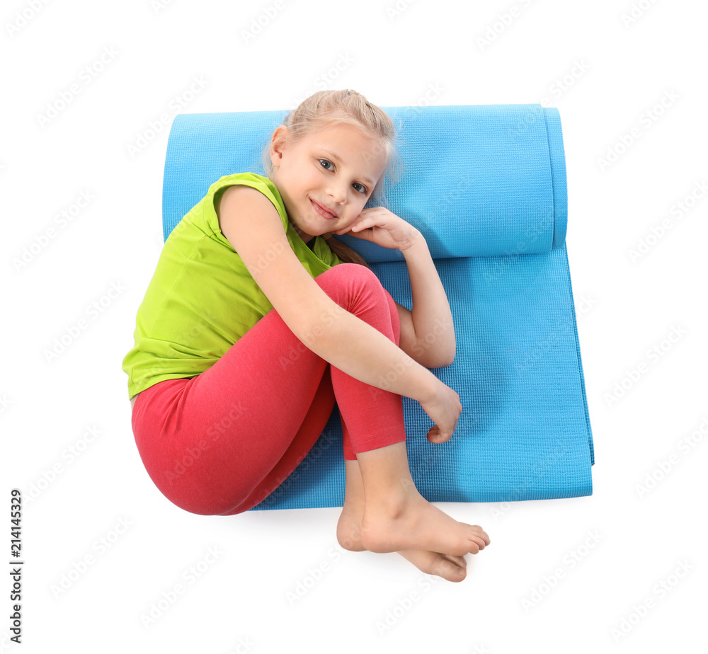 Little girl with yoga mat on white background Stock Photo