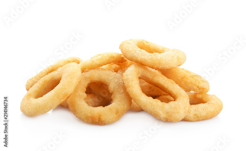 Freshly cooked onion rings on white background