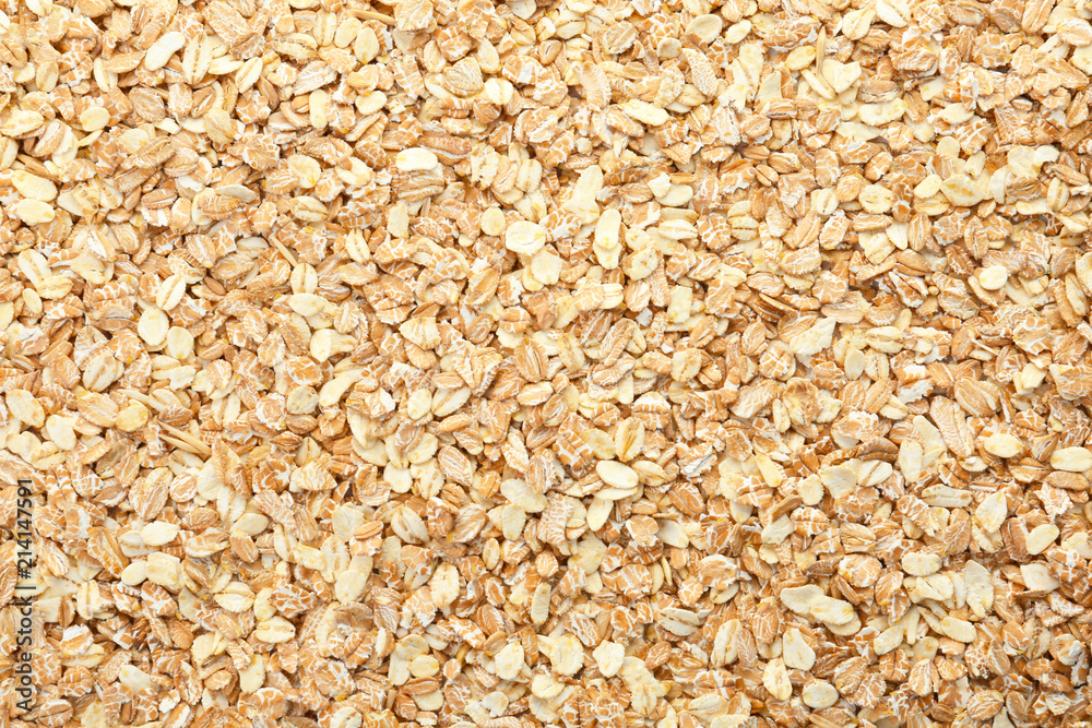 Raw oatmeal as background. Healthy grains and cereals Raw oatmeal as background. Healthy grains and cereals