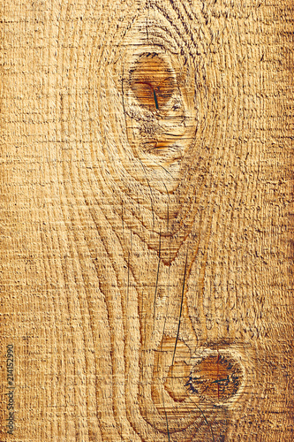 Rough wooden plank with knots