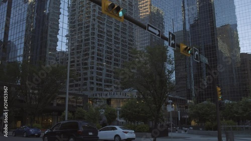 4K Reflections on Skyscrapers around second street in Downtown Calgary, Alberta, Canada - dusk, moving shot photo