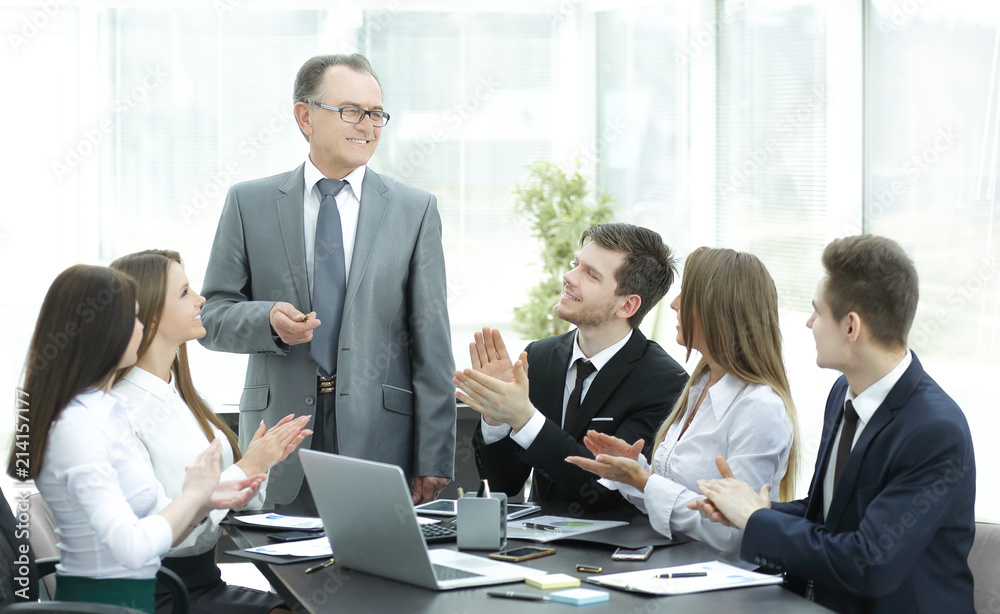 business team applauding leaders at the meeting. business team applauding leaders at the meeting.