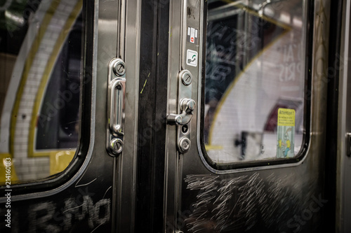 Closeup of door handle in subway train