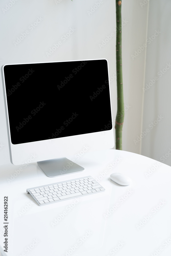desktop computer on white table