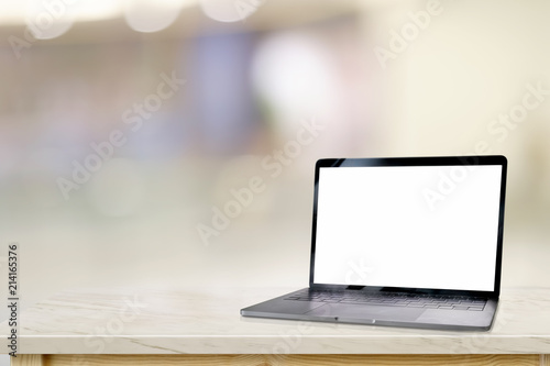 Mockup blank screen laptop over blurred bokeh background.