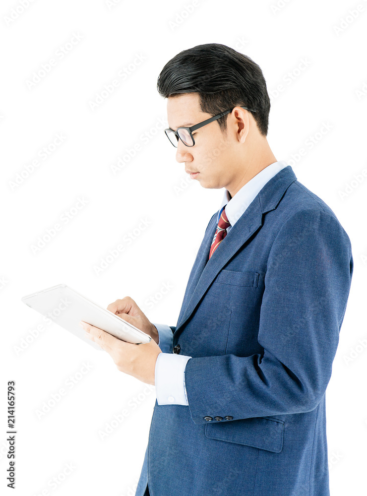 Businessman portrait in suit holding a laptop over white background Businessman portrait in suit holding a laptop over white background